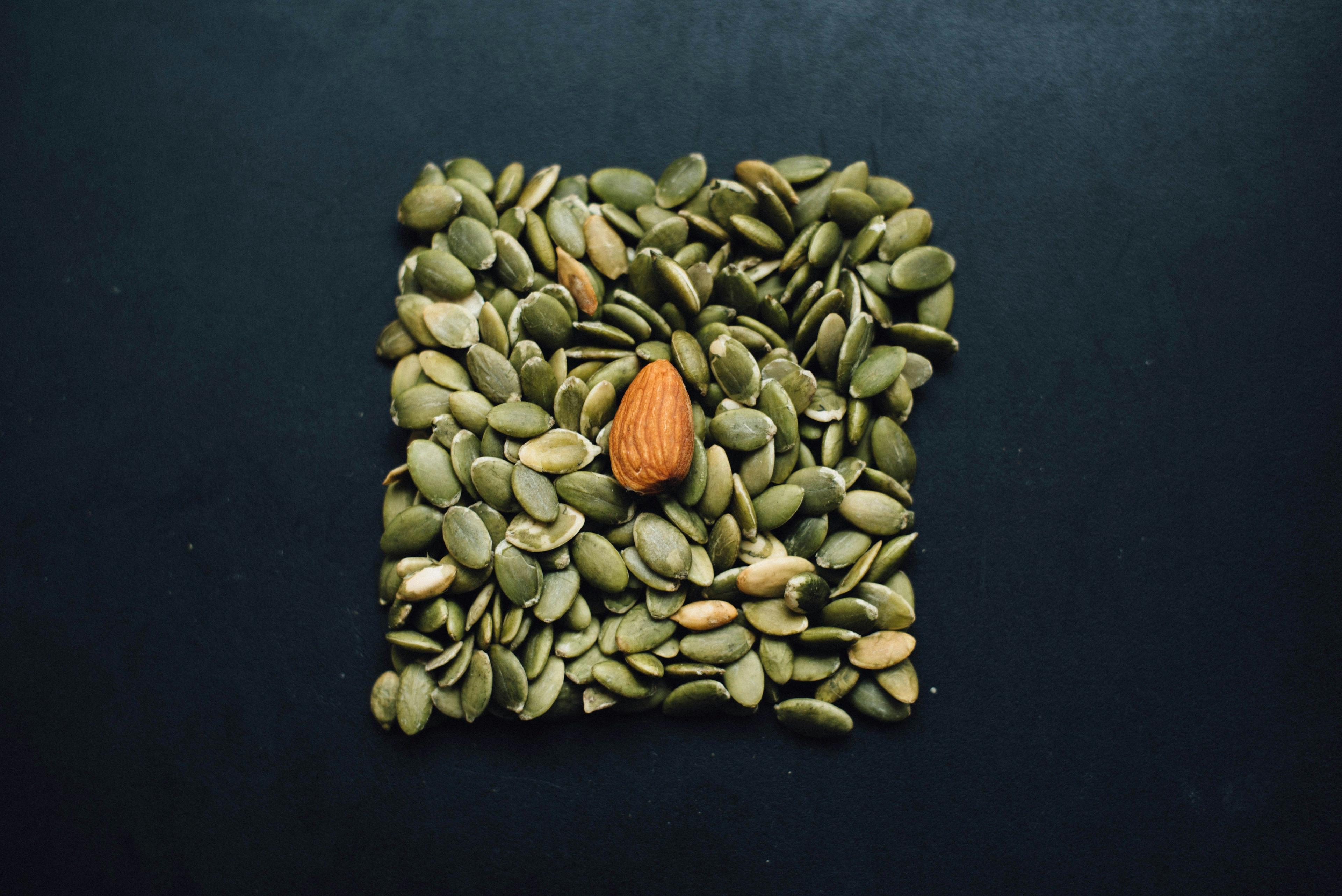 a square shaped picture made out of nuts