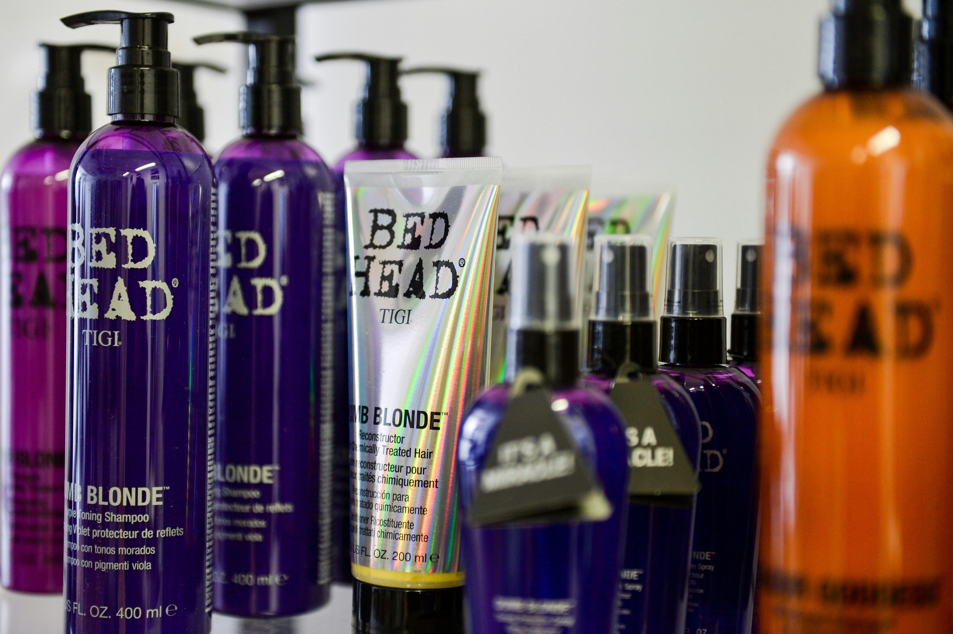 a row of different types of shampoos and conditioners