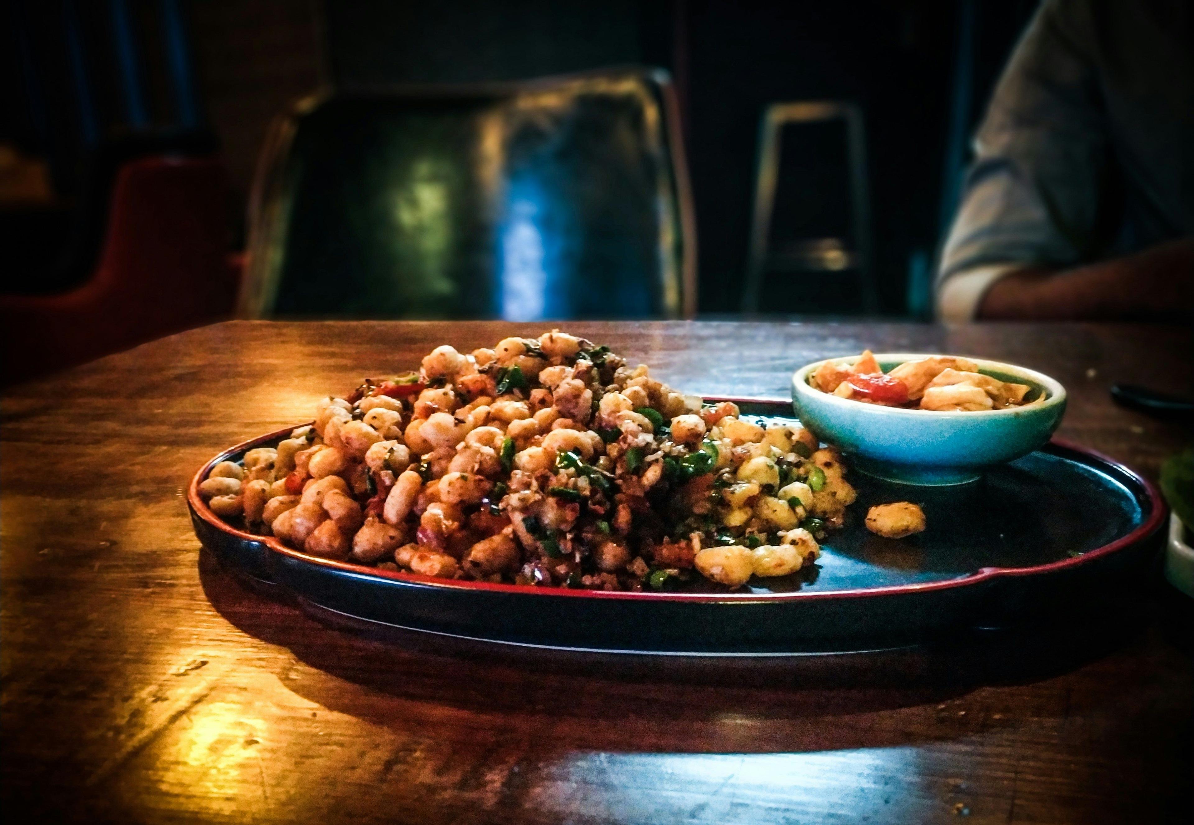 a plate of food on a wooden table