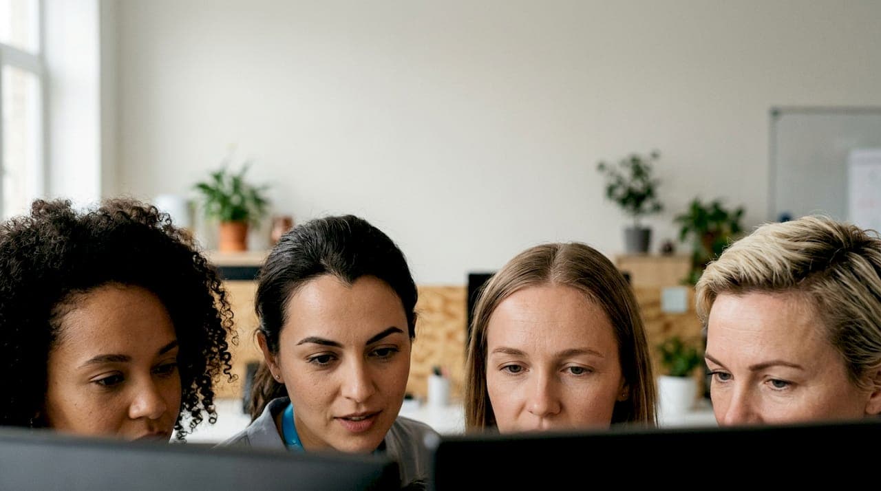 Closeup showing four different female hairline shapes
